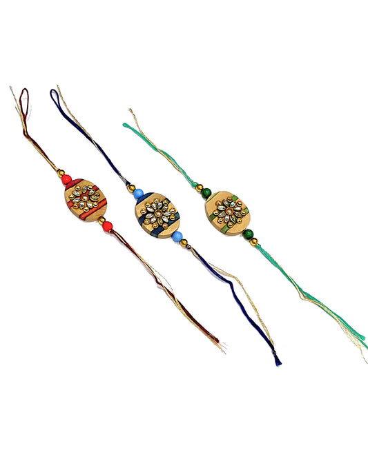 Indian Petals - Beautiful Handmade Rhinestone Pattern on Oval MDF Wood Rakhi for your Brother